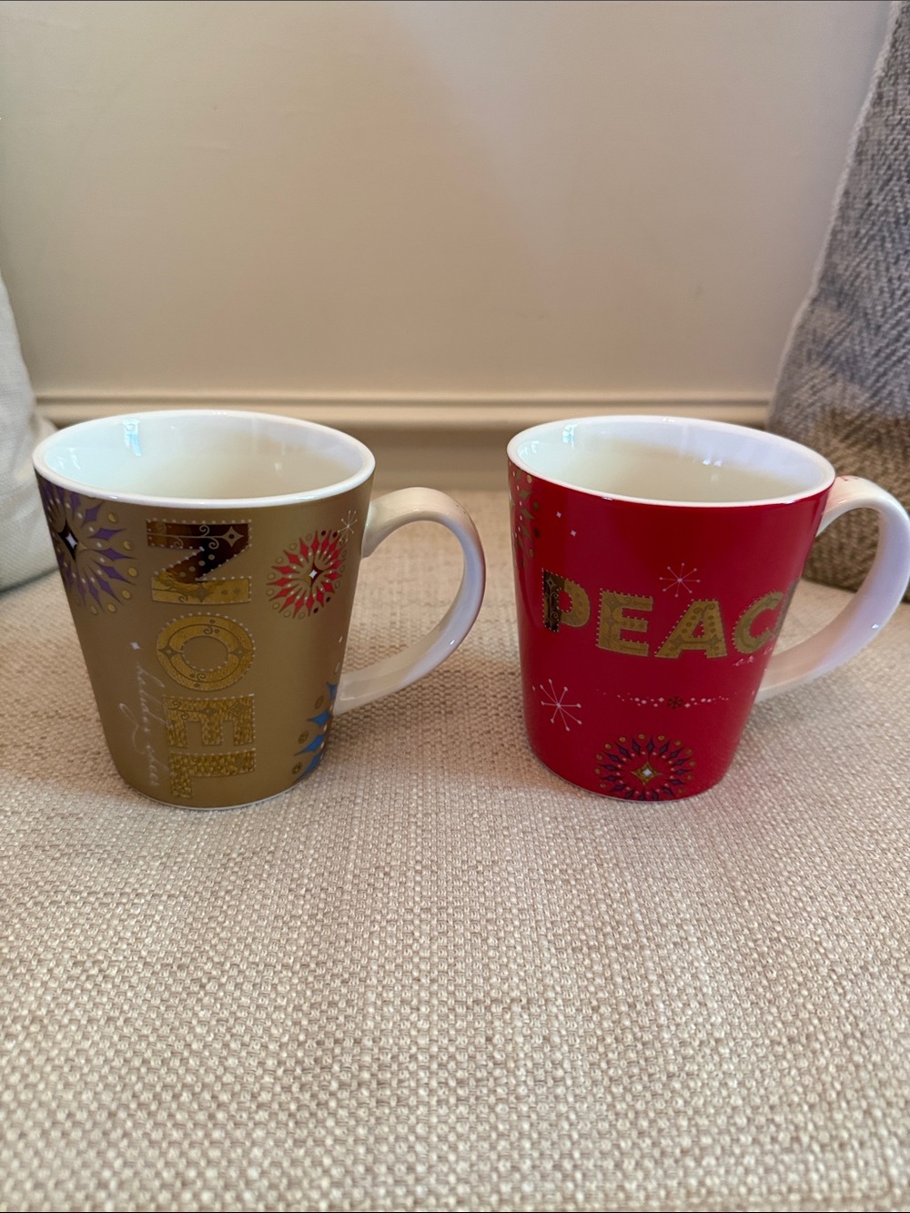 Set of 2 for $25 - Starbucks Red 'Peace' & Gold 'Noel' Ceramic Mug Set